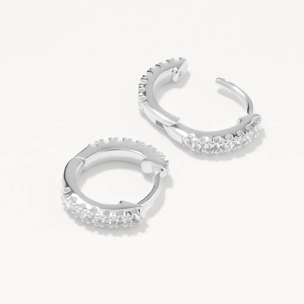 White Topaz Rainbow Huggie Earrings in Silver